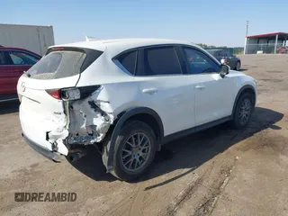 2017 Mazda CX-5 Sport with VIN JM3KFABL5H0124725, listed as a IAAI auction lot 40487298 with 103,889 mi miles. Bid and sale history available at carsss.com. Image 4.
