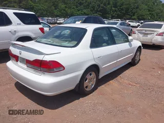 2002 Honda Accord EX z VIN 1HGCG16592A037760, wystawiony jako IAAI lot #42334100 z przebiegiem 271 805 mil mil oraz . Historia ofert i sprzedaży dostępna na DreamBid. Obrazek 4.
