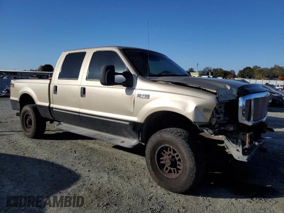 2000 Ford Super Duty F-250 XL with VIN 1FTNW21S9YEA79229, listed as a Copart auction lot 79939304 with 276,795 mi miles and Salvage Title. Bid and sale history available at carsss.com. Image 4.