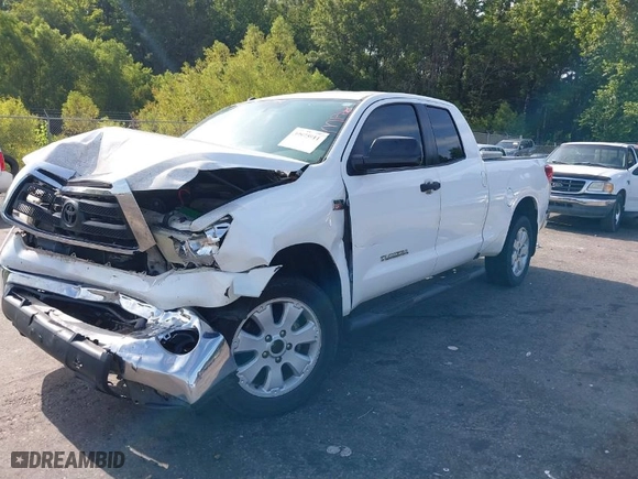2012 Toyota Tundra 2WD Truck with VIN 5TFRY5F16CX130129, listed as a IAAI auction lot 39975911 with 256,778 mi miles. Bid and sale history available at carsss.com. Image 2.