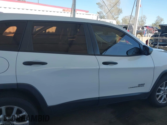 2015 Jeep Cherokee Sport z VIN 1C4PJLAB7FW566286, wystawiony jako IAAI lot #42239202 z przebiegiem 117 761 mil mil oraz . Historia ofert i sprzedaży dostępna na DreamBid. Obrazek 13.