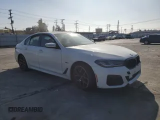 2023 BMW 5 Series 530e with VIN WBA13AG02PCL73814, listed as a Copart auction lot 86818824 with Not provided miles and Salvage title. Bid and sale history available at DreamBid. Image 4.