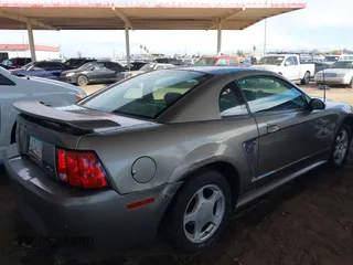 2002 Ford Mustang Standard with VIN 1FAFP40442F212762, listed as a IAAI auction lot 41776411 with 166,183 mi miles. Bid and sale history available at carsss.com. Image 4.