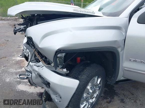 2019 GMC Sierra 2500HD Denali with VIN 1GT12SEY4KF243612, listed as a IAAI auction lot 41962727 with 71,936 mi miles. Bid and sale history available at carsss.com. Image 20.