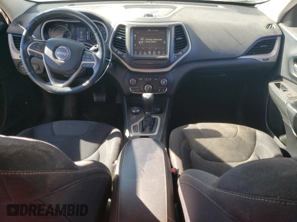 2015 Jeep Cherokee Latitude с VIN 1C4PJMCS8FW619774, выставлен на аукционе Copart как лот 76466254 с пробегом 130 035 миль миль и Списание • Salvage title. История ставок и продаж доступна на DreamBid. Изображение 8.