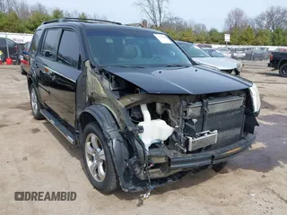 2014 Honda Pilot EX-L with VIN 5FNYF4H57EB009635, listed as a IAAI auction lot 41915219 with 272,017 mi miles. Bid and sale history available at carsss.com. Image 6.