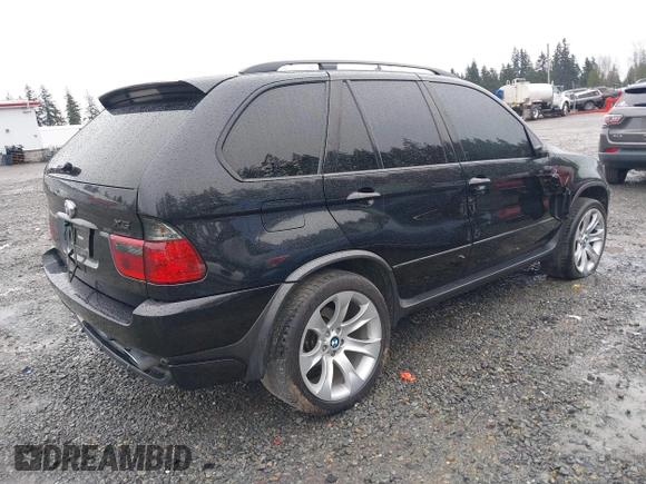 2005 BMW X5 4.8is with VIN 5UXFA93515LE82570, listed as a IAAI auction lot 41759657 with 212,687 mi miles. Bid and sale history available at carsss.com. Image 4.