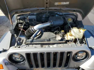 2001 Jeep Wrangler SE with VIN 1J4FA29P11P334902, listed as a Copart auction lot 83883654 with 157,827 mi miles and Salvage Title. Bid and sale history available at carsss.com. Image 12.