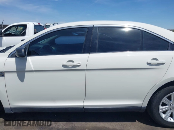2011 Ford Taurus SE with VIN 1FAHP2DW1BG165371, listed as a IAAI auction lot 42164608 with 186,485 mi miles. Bid and sale history available at carsss.com. Image 15.