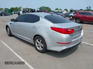 2015 Kia Optima LX z VIN 5XXGM4A7XFG452440, wystawiony jako IAAI lot #42415617 z przebiegiem 68 474 mil mil oraz . Historia ofert i sprzedaży dostępna na DreamBid. Obrazek 3.