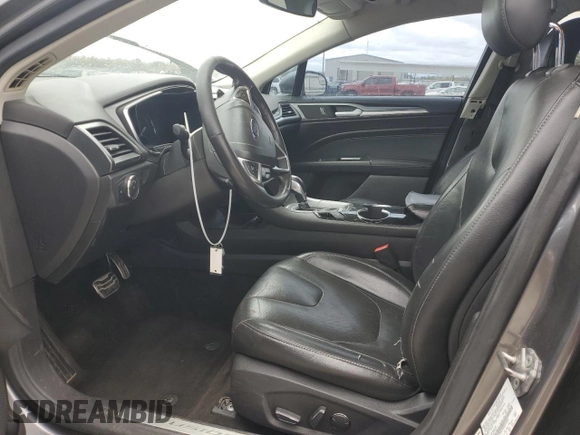 2014 Ford Fusion Titanium with VIN 3FA6P0K94ER331002, listed as a Copart auction lot 49733575 with 208,656 mi miles and Salvage Title. Bid and sale history available at DreamBid. Image 7.