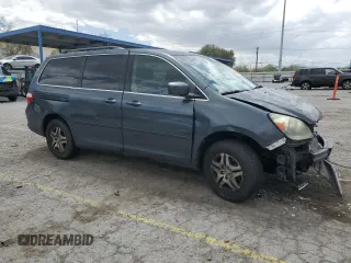 2005 Honda Odyssey EX-L with VIN 5FNRL38645B049087, listed as a Copart auction lot 56891275 with 194,587 mi miles and Salvage title. Bid and sale history available at DreamBid. Image 4.