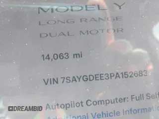 2023 Tesla Model Y Long Range with VIN 7SAYGDEE3PA152683, listed as a IAAI auction lot 41798988 with 14,063 mi miles and . Bid and sale history available at carsss.com. Image 7.