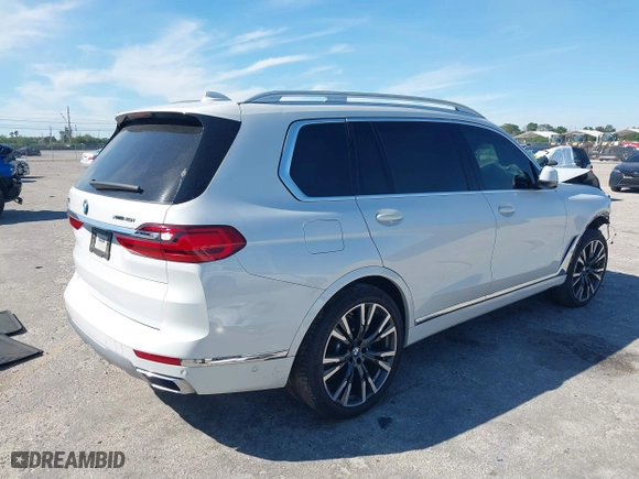 2020 BMW X7 xDrive40i with VIN 5UXCW2C00L9A03002, listed as a IAAI auction lot 41856130 with 33,713 mi miles. Bid and sale history available at carsss.com. Image 4.