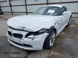 2014 BMW Z4 sDrive35i with VIN WBALM7C58EE386241, listed as a IAAI auction lot 41694078 with 66,884 mi miles. Bid and sale history available at carsss.com. Image 2.