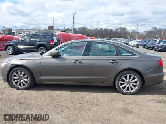 2013 Audi A6 Premium Plus z VIN WAUGGAFC1DN038375, wystawiony jako IAAI lot #42051929 z przebiegiem 118 181 mil mil oraz . Historia ofert i sprzedaży dostępna na DreamBid. Obrazek 17.