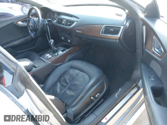 2016 Audi A7 3.0 Premium Plus with VIN WAUWGAFC8GN012047, listed as a IAAI auction lot 41012423 with 77,778 mi miles. Bid and sale history available at carsss.com. Image 5.