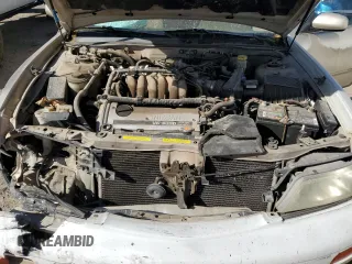 1998 Nissan Maxima GXE with VIN JN1CA21D0WM903051, listed as a Copart auction lot 47821445 with 156,748 mi miles and Salvage title. Bid and sale history available at DreamBid. Image 13.