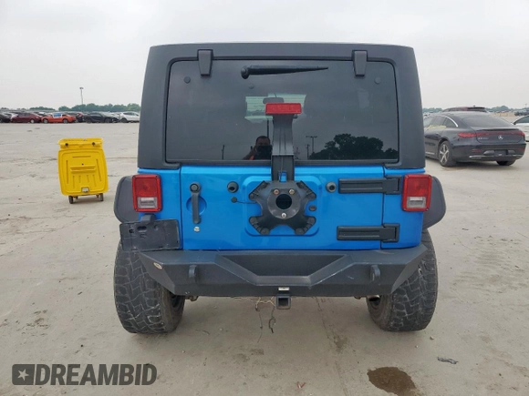 2015 Jeep Wrangler Unlimited Sport with VIN 1C4BJWDG1FL726599, listed as a Copart auction lot 57483935 with 112,067 mi miles and Clean title. Bid and sale history available at DreamBid. Image 6.