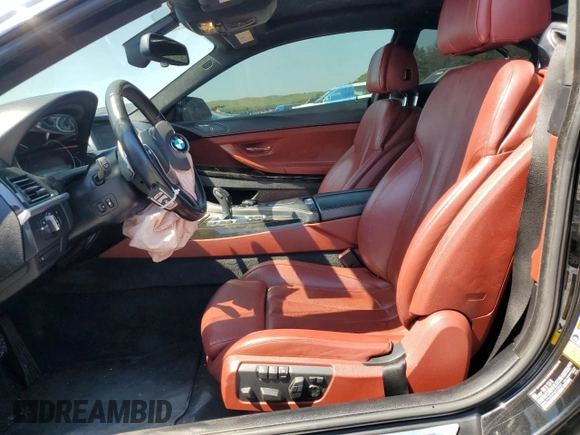2015 BMW 6 Series z VIN WBALY1C57FDZ73541, wystawiony jako Copart lot #57294034 z przebiegiem 136 357 mil mil oraz Czysty tytuł • Clean title. Historia ofert i sprzedaży dostępna na DreamBid. Obrazek 7.