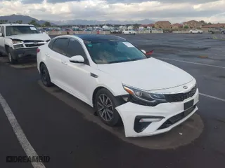 2019 Kia Optima EX with VIN 5XXGU4L14KG302388, listed as a IAAI auction lot 40636313 with 135,095 mi miles. Bid and sale history available at carsss.com. Image 1.