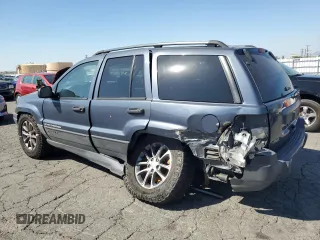 2003 Jeep Grand Cherokee Laredo with VIN 1J4GX48S73C539185, listed as a Copart auction lot 46687915 with 265,008 mi miles and Salvage Title. Bid and sale history available at carsss.com. Image 2.
