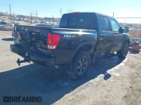 2014 Nissan Titan S with VIN 1N6AA0EC6EN506928, listed as a IAAI auction lot 41380319 with 102,669 mi miles and . Bid and sale history available at DreamBid. Image 4.