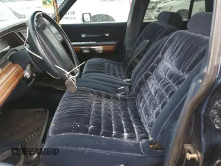 1991 Mercury Grand Marquis z VIN 2MECM75F1MX654700, wystawiony jako Copart lot #51007165 z przebiegiem 53 825 mil mil oraz Szkody całkowita. Historia ofert i sprzedaży dostępna na DreamBid. Obrazek 7.