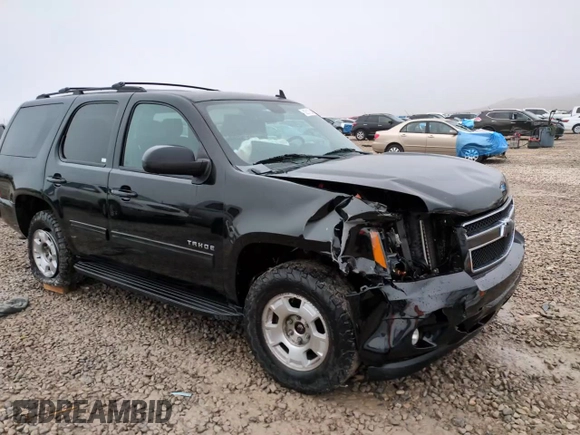 2014 Chevrolet Tahoe LT z VIN 1GNSKBE06ER131287, wystawiony jako Copart lot #82617224 z przebiegiem 138 880 mil mil oraz Szkoda całkowita • Salvage title. Historia ofert i sprzedaży dostępna na DreamBid. Obrazek 14.