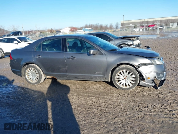 2010 Ford Fusion Hybrid with VIN 3FADP0L39AR125251, listed as a IAAI auction lot 41100606 with 235,612 mi miles. Bid and sale history available at carsss.com. Image 13.