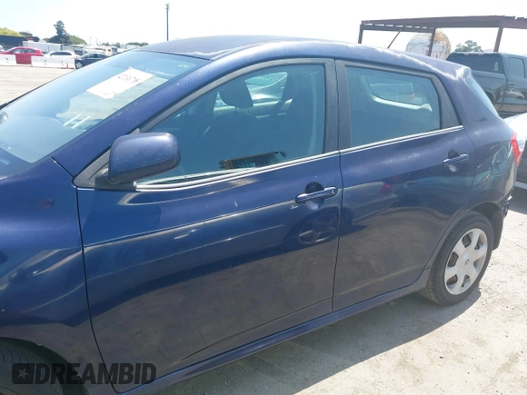 2009 Toyota Matrix with VIN 2T1KU40E99C119135, listed as a IAAI auction lot 42136716 with 185,155 mi miles. Bid and sale history available at carsss.com. Image 14.