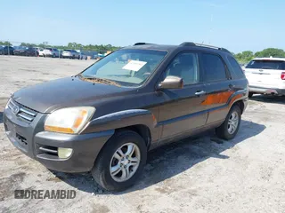 2005 Kia Sportage LX with VIN KNDJF723557133872, listed as a IAAI auction lot 42203702 with 181,132 mi miles and . Bid and sale history available at carsss.com. Image 2.