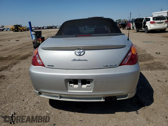 2006 Toyota Solara SE z VIN 4T1FA38P06U094064, wystawiony jako Copart lot #55917025 z przebiegiem 76 937 mil mil oraz Szkoda całkowita • Salvage title. Historia ofert i sprzedaży dostępna na DreamBid. Obrazek 6.