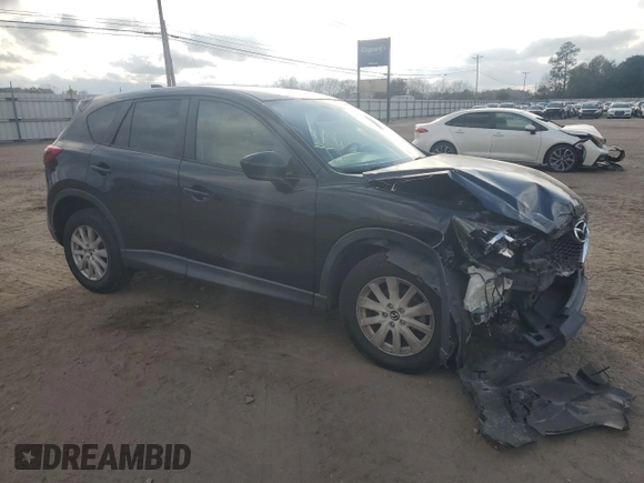 2014 Mazda CX-5 Touring with VIN JM3KE2CY9E0336218, listed as a Copart auction lot 49213255 with 124,749 mi miles and Salvage Title. Bid and sale history available at carsss.com. Image 4.