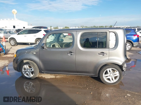2013 Nissan Cube SL z VIN JN8AZ2KR8DT301092, wystawiony jako IAAI lot #41328574 z przebiegiem Nie podano mil oraz . Historia ofert i sprzedaży dostępna na DreamBid. Obrazek 15.