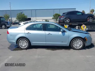 2010 Mercury Milan Hybrid with VIN 3MEDM0L35AR641477, listed as a IAAI auction lot 42443628 with 102,890 mi miles and . Bid and sale history available at DreamBid. Image 14.