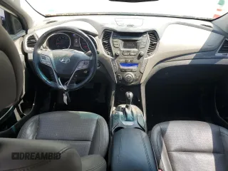 2013 Hyundai Santa Fe Sport z VIN 5XYZUDLA2DG069389, wystawiony jako Copart lot #64054684 z przebiegiem 162 861 mil mil oraz Szkoda całkowita • Salvage title. Historia ofert i sprzedaży dostępna na DreamBid. Obrazek 8.