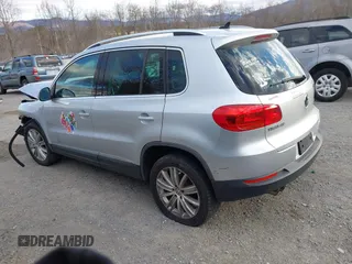 2012 Volkswagen Tiguan SE with VIN WVGAV7AX2CW543003, listed as a IAAI auction lot 41803970 with 187,639 mi miles and . Bid and sale history available at DreamBid. Image 3.