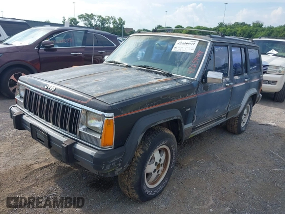 1991 Jeep Cherokee z VIN 1J4FJ58S6ML572036, wystawiony jako IAAI lot #42659999 z przebiegiem 200 845 mil mil oraz . Historia ofert i sprzedaży dostępna na DreamBid. Obrazek 2.