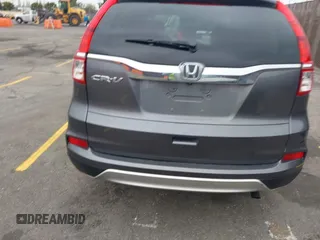 2015 Honda CR-V EX with VIN 3CZRM3H51FG704087, listed as a IAAI auction lot 42074521 with 74,610 mi miles and . Bid and sale history available at carsss.com. Image 16.