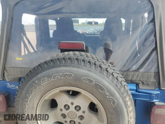 2003 Jeep Wrangler Sport with VIN 1J4FA49S53P350281, listed as a Copart auction lot 56634005 with 158,974 mi miles and Salvage title. Bid and sale history available at DreamBid. Image 10.