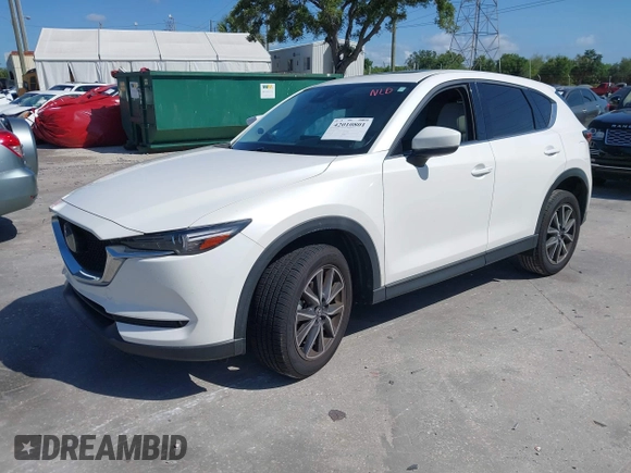 2018 Mazda CX-5 Grand Touring with VIN JM3KFADM2J1422512, listed as a IAAI auction lot 42010801 with 48,567 mi miles and . Bid and sale history available at DreamBid. Image 17.