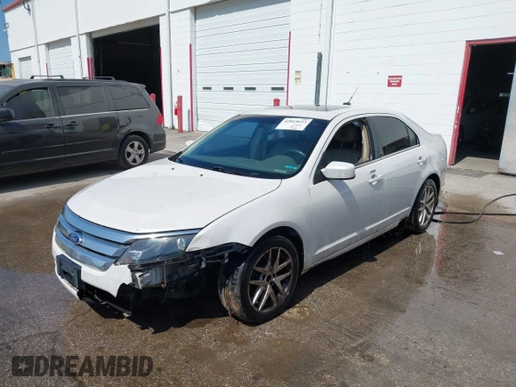 2011 Ford Fusion SEL with VIN 3FAHP0JAXBR124596, listed as a IAAI auction lot 42019623 with 239,177 mi miles and . Bid and sale history available at carsss.com. Image 2.