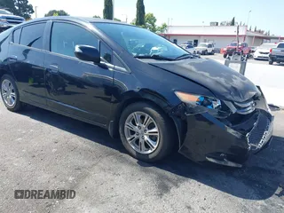 2010 Honda Insight EX with VIN JHMZE2H7XAS031668, listed as a IAAI auction lot 42344406 with 138,139 mi miles and . Bid and sale history available at DreamBid. Image 1.