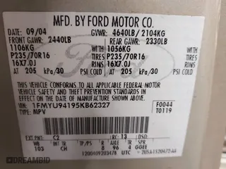 2005 Ford Escape Limited with VIN 1FMYU94195KB62327, listed as a IAAI auction lot 41910709 with 116,086 mi miles. Bid and sale history available at carsss.com. Image 9.
