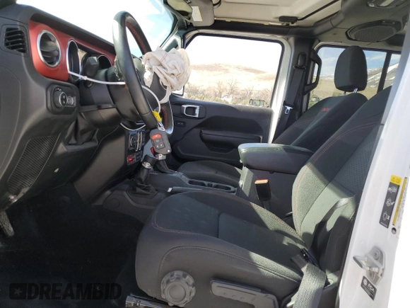 2022 Jeep Gladiator Rubicon z VIN 1C6JJTBG4NL135430, wystawiony jako Copart lot #52581015 z przebiegiem 54 553 mil mil oraz Szkoda całkowita • Salvage title. Historia ofert i sprzedaży dostępna na DreamBid. Obrazek 7.