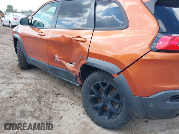 2015 Jeep Cherokee Trailhawk с VIN 1C4PJMBS8FW757154, выставлен на аукционе IAAI как лот 42591946 с пробегом 163 740 миль миль и . История ставок и продаж доступна на DreamBid. Изображение 6.
