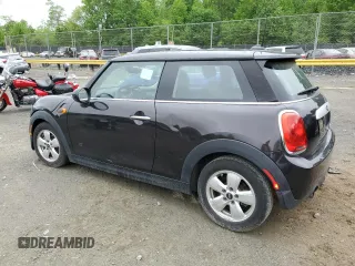 2014 MINI Hardtop with VIN WMWXM5C57ET932920, listed as a Copart auction lot 55810575 with 73,151 mi miles and Salvage title. Bid and sale history available at DreamBid. Image 2.