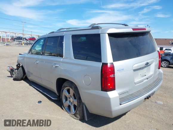 2016 Chevrolet Tahoe LTZ with VIN 1GNSKCKC1GR452600, listed as a IAAI auction lot 42305719 with 121,041 mi miles and . Bid and sale history available at DreamBid. Image 3.