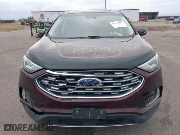 2020 Ford Edge Titanium z VIN 2FMPK4K91LBB56297, wystawiony jako IAAI lot #41938896 z przebiegiem 79 875 mil mil oraz . Historia ofert i sprzedaży dostępna na DreamBid. Obrazek 12.